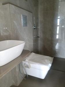 Common Bathroom Image of 1125 Sq.ft 2 BHK Apartment / Flat for sale in NMS One 27, Kharghar Navi Mumbai for Rs. 12000000