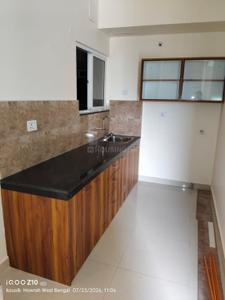 Kitchen Image of 911 Sq.ft 2 BHK Apartment / Flat for rent in Shapoorji Pallonji Western Heights Joyville, Kona Howrah for Rs. 16000
