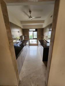 Kitchen Image of 950 Sq.ft 2 BHK Apartment / Flat for rent in Shreedham Classic, Goregaon West Mumbai for Rs. 65000