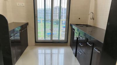 Kitchen Image of 715 Sq.ft 1 BHK Apartment / Flat for rent in Gajra Bhoomi Gardenia 1, Kalamboli Navi Mumbai for Rs. 18000