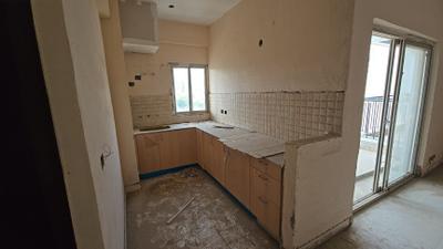 Kitchen Image of 1215 Sq.ft 2 BHK Apartment / Flat for sale in Amrapali Dream Valley 2, Noida Extension Greater Noida for Rs. 8900000