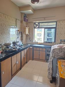 Kitchen Image of 950 Sq.ft 2 BHK Apartment / Flat for sale in Suyog Darshan Apartments, Andheri West Mumbai for Rs. 24000000