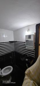 Bathroom Image of 500 Sq.ft 1 RK Independent House for rent in Ghorpadi Pune for Rs. 16000