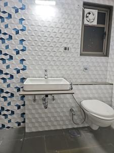 Common Bathroom Image of 1300 Sq.ft 3 BHK Apartment / Flat for sale in Mantra Mesmer, Mundhwa Pune for Rs. 12500000