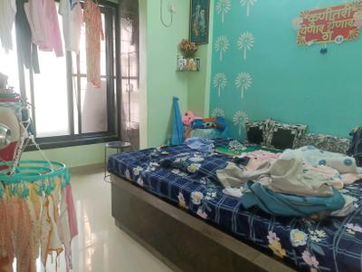 Bedroom Image of 600 Sq.ft 1 BHK Builder Floor for sale in Kamothe Navi Mumbai for Rs. 5300000