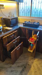 Kitchen Image of 670 Sq.ft 2 BHK Apartment / Flat for sale in Paschim Putiary Kolkata for Rs. 3300000
