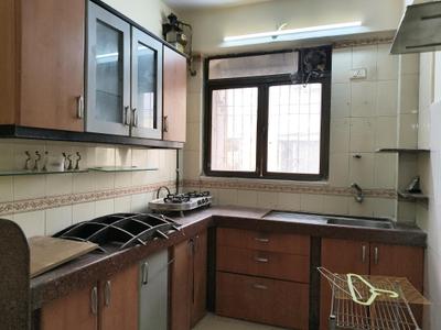 Kitchen Image of 544 Sq.ft 1 BHK Apartment / Flat for rent in Ajmera Bhakti Park, Wadala East Mumbai for Rs. 44000