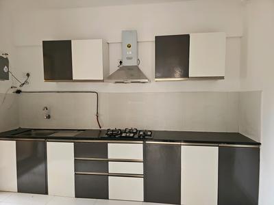 Kitchen Image of 990 Sq.ft 2 BHK Apartment / Flat for sale in Pride World City, Charholi Budruk Pune for Rs. 9600000