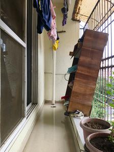Living Room Image of 900 Sq.ft 2 BHK Apartment / Flat for sale in Happy Home Sarvoday Swaroop, Dombivli East Thane for Rs. 6900000