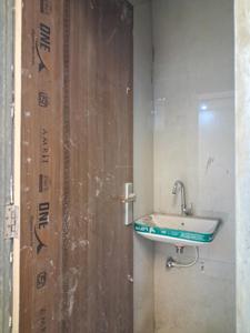 Common Bathroom Image of 980 Sq.ft 2 BHK Apartment / Flat for sale in Sector 49 Noida for Rs. 3700000