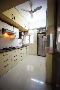 Kitchen Image of 1450 Sq.ft 3 BHK Apartment / Flat for sale in Mahalunge Pune for Rs. 21000000