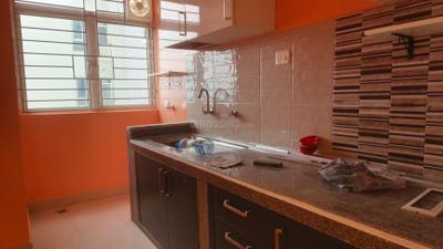 Kitchen Image of 974 Sq.ft 2 BHK Apartment / Flat for rent in Rishi Pranaya , Rajarhat Kolkata for Rs. 26000
