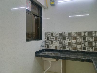 Kitchen Image of 958 Sq.ft 2 BHK Apartment / Flat for sale in Amrut Laxmi Raj Regalia Phase I, Ambernath East Ambernath for Rs. 3400000