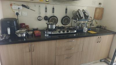 Kitchen Image of 633 Sq.ft 1 BHK Apartment / Flat for rent in Vaswani Menlo Park, Munnekollal Bengaluru for Rs. 35000