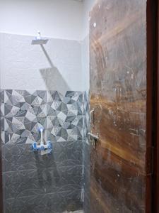 Common Bathroom Image of 650 Sq.ft 1 BHK Apartment / Flat for sale in Krishna Apartment, Sector 49 Noida for Rs. 2800000