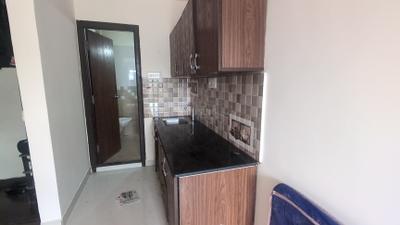 Kitchen Image of 250 Sq.ft 1 RK Builder Floor for rent in Adugodi Bengaluru for Rs. 13000