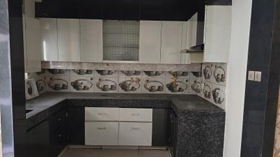 Kitchen Image of 1040 Sq.ft 2 BHK Apartment / Flat for sale in Panchsheel Wellington, Crossings Republik Ghaziabad for Rs. 7900000