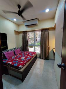 Bedroom Image of 910 Sq.ft 2 BHK Apartment / Flat for rent in Lodha Amara, Kolshet Thane for Rs. 49000
