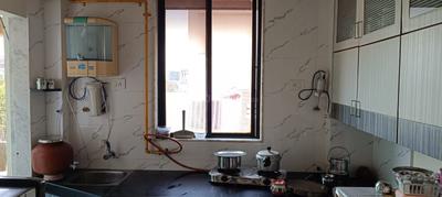 Kitchen Image of 702 Sq.ft 1 BHK Apartment / Flat for rent in Kudasan Gandhinagar for Rs. 18000