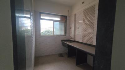 Kitchen Image of 730 Sq.ft 1 BHK Apartment / Flat for sale in Mohan Willows I, Badlapur East Badlapur for Rs. 2600000