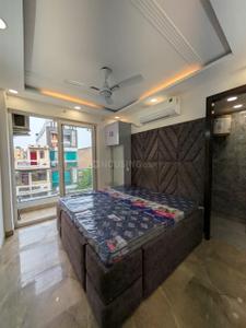 Bedroom Image of 900 Sq.ft 2 BHK Builder Floor for rent in Rajouri Garden New Delhi for Rs. 31000
