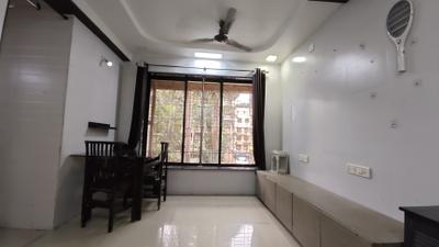 Living Room Image of 580 Sq.ft 1 BHK Apartment / Flat for rent in Kalash Udhyan Complex, Kopar Khairane Navi Mumbai for Rs. 30000