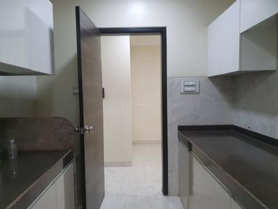 Kitchen Image of 704 Sq.ft 2 BHK Apartment / Flat for sale in SMGK Woods Platina Wing B Ebony Tower, Jogeshwari West Mumbai for Rs. 17500000