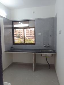 Kitchen Image of 550 Sq.ft 1 BHK Apartment / Flat for sale in Shree Galaxy Vrundavan, Vangani Thane for Rs. 1575000