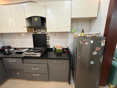 Kitchen Image of 1500 Sq.ft 2 BHK Builder Floor for rent in Sector 27 Gurgaon for Rs. 51000