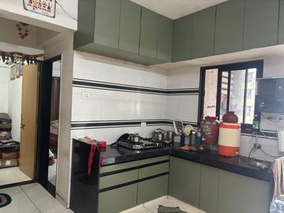 Kitchen Image of 950 Sq.ft 2 BHK Apartment / Flat for rent in Prayosha Bliss, Dindoli Surat for Rs. 15000
