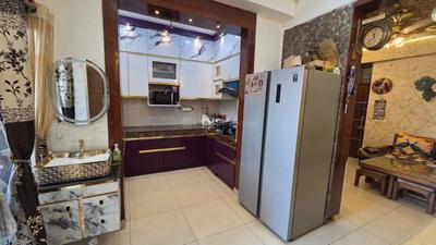 Kitchen Image of 1475 Sq.ft 2.5 BHK Apartment / Flat for sale in Paramount Symphony, Crossings Republik Ghaziabad for Rs. 11000000