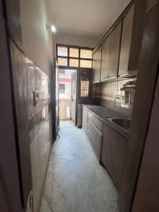 Kitchen Image of 350 Sq.ft 1 BHK Builder Floor for rent in Rohini Builder Floors, Sector 24 Rohini New Delhi for Rs. 10000