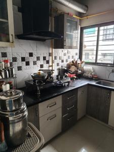 Kitchen Image of 1008 Sq.ft 2 BHK Apartment / Flat for rent in Simandhar Residancy 2, Ghatlodiya Ahmedabad for Rs. 25000