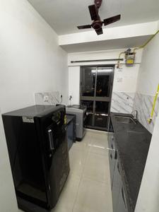 Kitchen Image of Laxmi Residency in Kandivali East, Mumbai