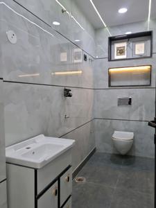 Common Bathroom Image of 900 Sq.ft 3 BHK Apartment / Flat for sale in Dwarka Mor New Delhi for Rs. 7200000