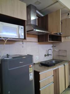 Kitchen Image of 425 Sq.ft 1 RK Apartment / Flat for rent in Supertech Eco Suites, Sector 137 Noida for Rs. 20500