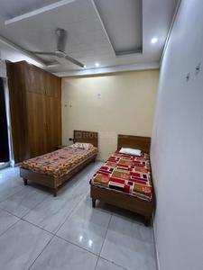 Bedroom Image of Grihum pg in Sector 56, Noida