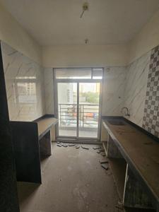Kitchen Image of 700 Sq.ft 1 BHK Apartment / Flat for sale in Bhoomi Lawns Phase II, Shilgaon Thane for Rs. 3800000