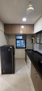 Kitchen Image of 910 Sq.ft 2 BHK Apartment / Flat for rent in Jogeshwari West Mumbai for Rs. 72000