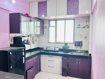 Kitchen Image of 750 Sq.ft 2 BHK Apartment / Flat for rent in Shiv Divine Dew, Rahatani Pune for Rs. 27000