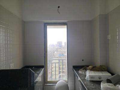Kitchen Image of 930 Sq.ft 2 BHK Apartment / Flat for sale in Laxmi Avenue D Global City, Virar West Virar for Rs. 4400000