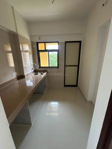 Kitchen Image of 695 Sq.ft 1 BHK Apartment / Flat for sale in Cosmos Meluha, Khidkali Thane for Rs. 4300000