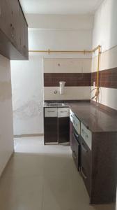 Kitchen Image of 680 Sq.ft 1 BHK Apartment / Flat for rent in Signature Sampad, Sarkhej Ahmedabad for Rs. 15000