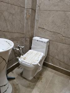 Common Bathroom Image of 400 Sq.ft 1 BHK Apartment / Flat for sale in Dwarka Mor New Delhi for Rs. 2500000