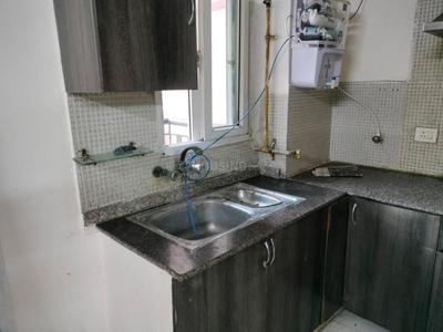 Kitchen Image of 900 Sq.ft 2 BHK Apartment / Flat for rent in Amrapali Silicon City, Sector 76 Noida for Rs. 36000