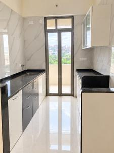 Kitchen Image of 950 Sq.ft 2 BHK Apartment / Flat for rent in Mohan Precious Greens, Ambernath East Ambernath for Rs. 20000