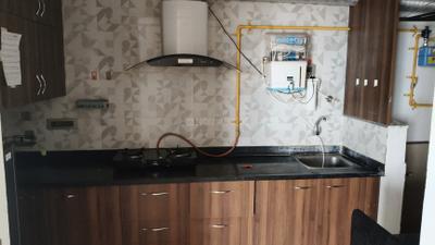Kitchen Image of 1305 Sq.ft 2 BHK Apartment / Flat for rent in Swagat Queens Land, Sargasan Gandhinagar for Rs. 27000