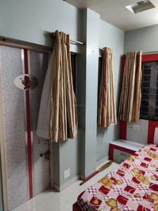 Bedroom Image of Unique Pg Gota Silver oak in Chanakyapuri, Ahmedabad
