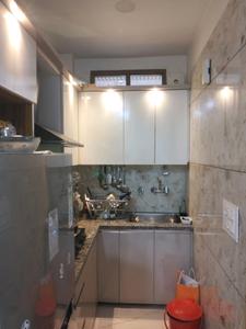 Kitchen Image of 560 Sq.ft 2 BHK Builder Floor for sale in Mahavir Enclave New Delhi for Rs. 4500000
