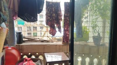 Balcony Image of 650 Sq.ft 1 BHK Apartment / Flat for sale in  Giri Govind Apartment, Kopar Khairane Navi Mumbai for Rs. 8700000